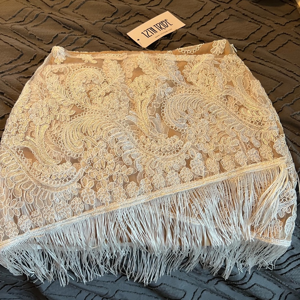 White cowgirl skirt with floral detail